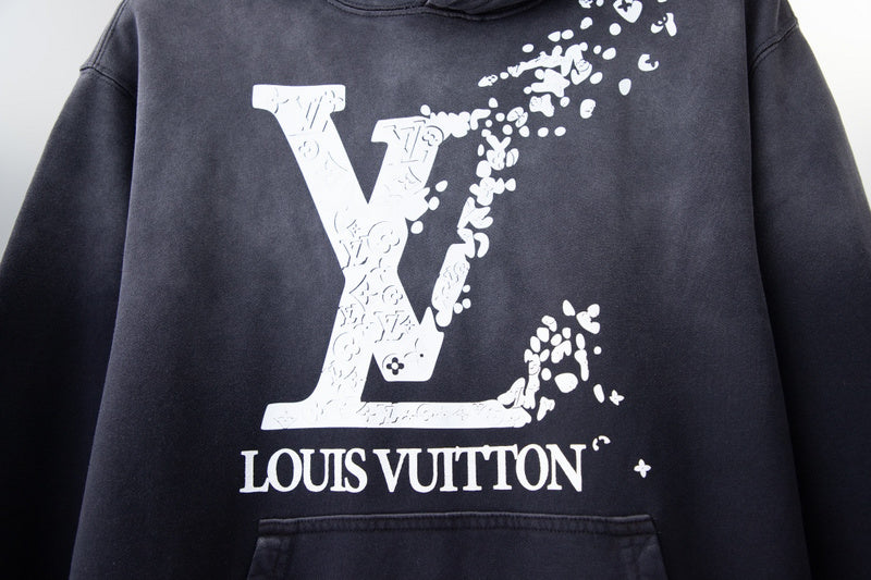 Flat lay presentation of Louis Vuitton luxury clothing with tailored silhouette