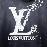 Flat lay presentation of Louis Vuitton luxury clothing with tailored silhouette