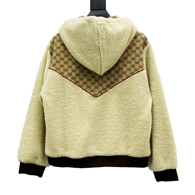 Side profile of Gucci luxury clothing with label-forward styling