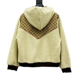 Side profile of Gucci luxury clothing with label-forward styling