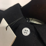 Back view of Gucci luxury clothing with monogram-inspired silhouette