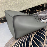 Styled lifestyle shot of statement chic women's handbag – women's luxury handbag