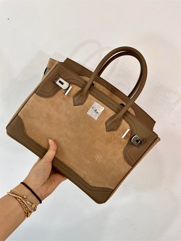  Contemporary top-handle bag carried on shoulder 10