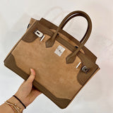  Contemporary top-handle bag carried on shoulder 10