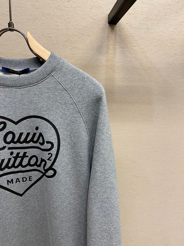 Full styled look of Louis Vuitton cotton t-shirt with signature branding