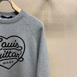 Full styled look of Louis Vuitton cotton t-shirt with signature branding