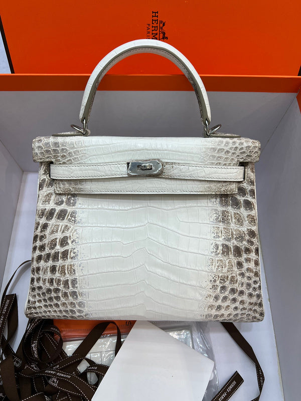 Side view of clean-lined structured handbag