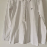 Full styled look of Lacoste luxury clothing with logo-detail design