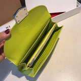 Side profile of premium polished women's handbag – women's designer-style accessory