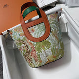  Streamlined top-handle bag carried on shoulder 16