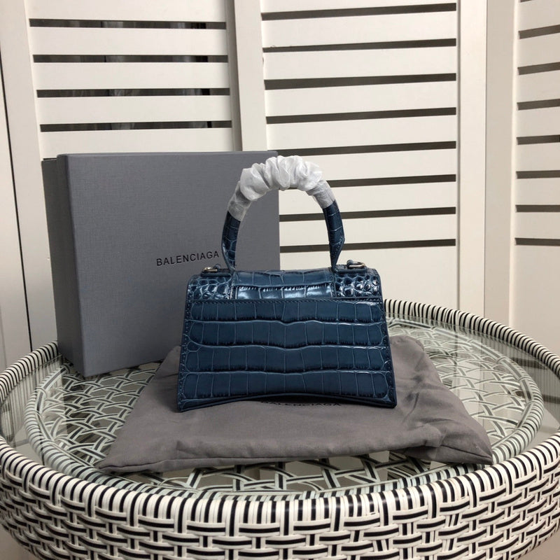 Styled lifestyle shot of sleek chic women's handbag – women's statement bag
