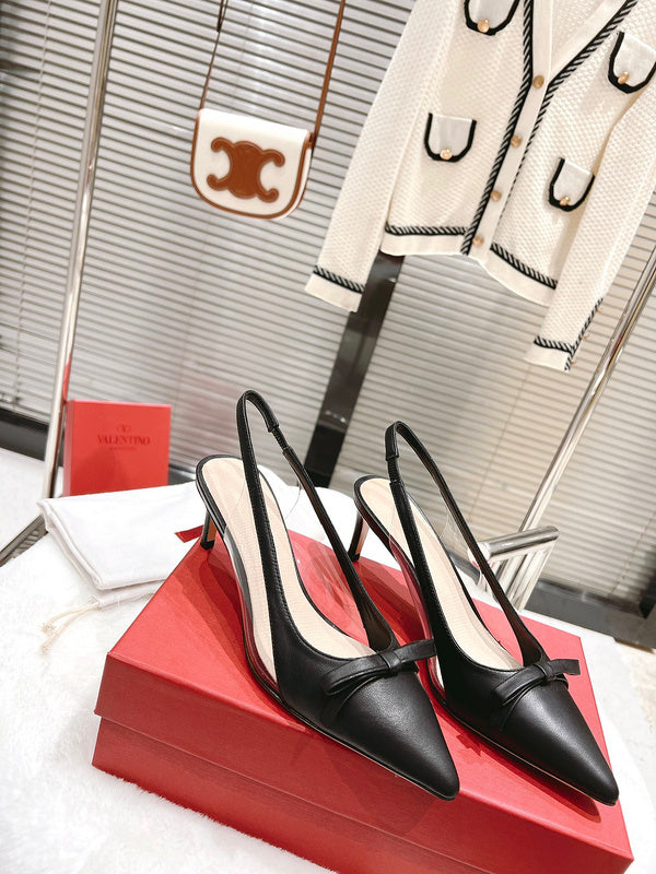Three-quarter angle view of Valentino Garavani luxury piece style No.199