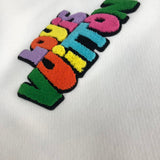 Front view of Louis Vuitton luxury clothing with signature branding