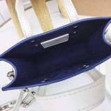 Handle and strap detail of premium chic women's handbag – women's luxury accessory