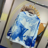 Side profile of Louis Vuitton luxury clothing with signature branding
