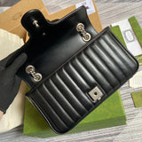 Side profile of polished signature women's handbag – women's luxury accessory