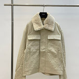 Front view of Louis Vuitton luxury clothing with monogram-inspired silhouette