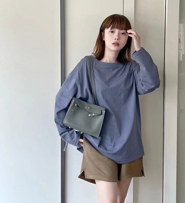 Side view of structured structured handbag