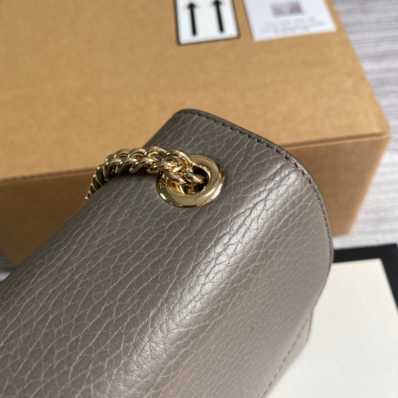 Styled lifestyle shot of elevated sleek women's handbag – women's statement bag
