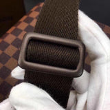 Handle and strap detail of polished classic women's handbag – women's luxury handbag