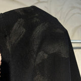 Balenciaga clothing close-up — premium authentic designer style