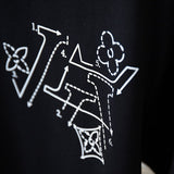 Flat lay presentation of Louis Vuitton cotton t-shirt with relaxed-fit cut