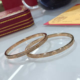 Front view of Cartier unisex jewelry piece