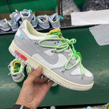 Side profile of Nike soft grey sneakers premium leather build