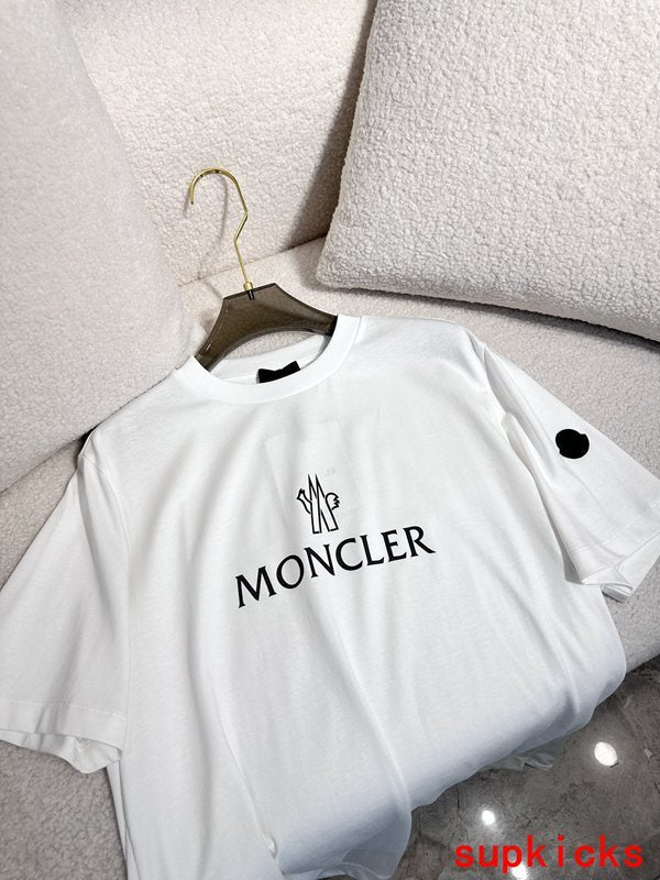 Side profile of Moncler luxury clothing with monogram-inspired silhouette
