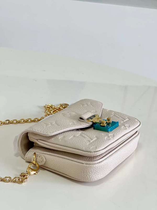Close-up detail of structured signature women's handbag – women's statement bag