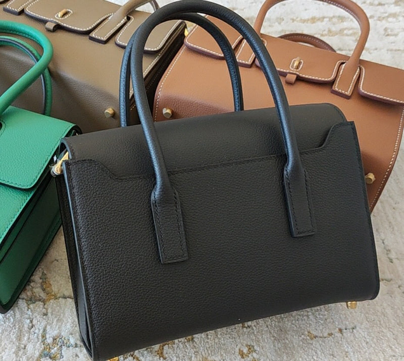 Close-up detail of sculpted bag design