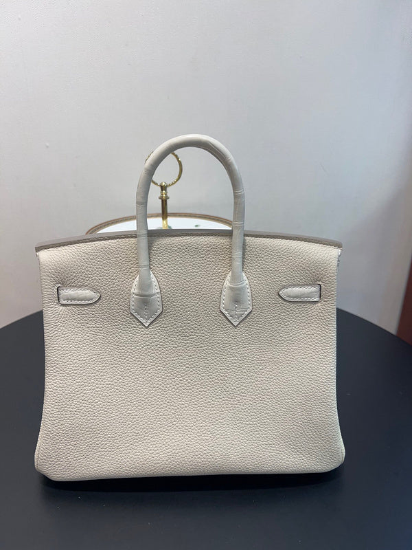 Side view of effortless structured handbag