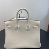 Side view of effortless structured handbag