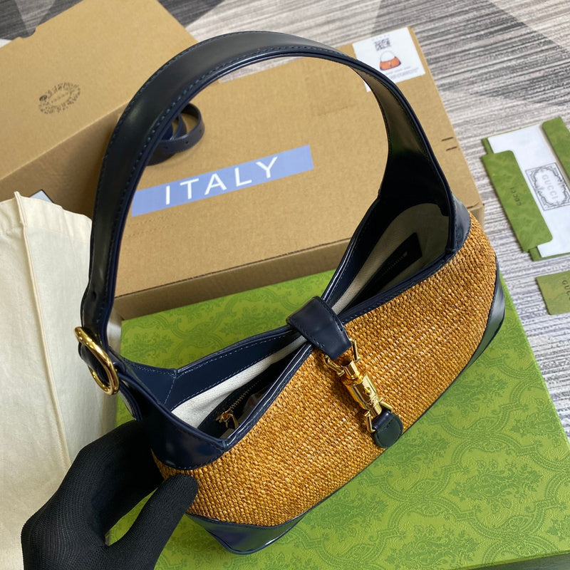 Back view of sleek premium women's handbag – women's statement bag