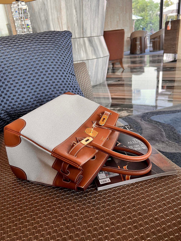 Side view of tailored structured handbag
