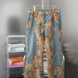 Front view of Louis Vuitton luxury clothing with logo-detail design