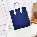 Styled lifestyle shot of premium chic women's handbag – women's luxury accessory
