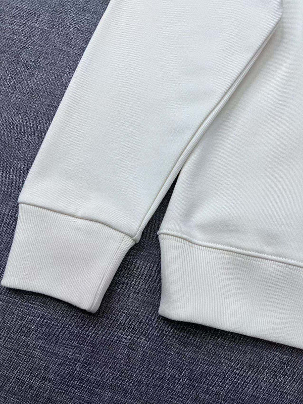 Side profile of Gucci luxury clothing with signature branding