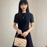  Sophisticated shoulder bag carried on shoulder 34