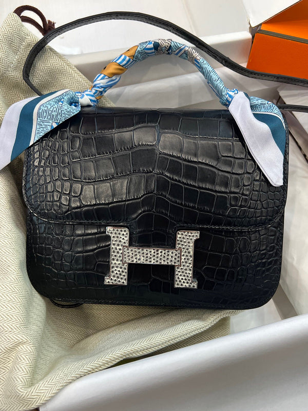 Side view of structured structured handbag