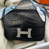 Side view of structured structured handbag