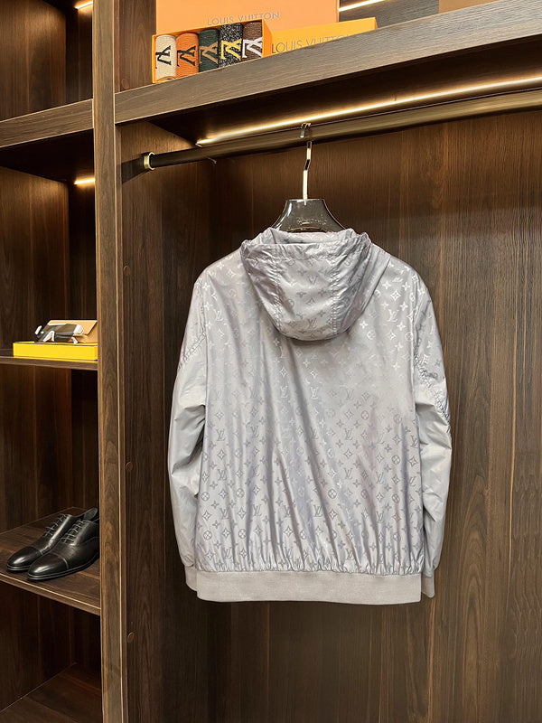 Close-up detail shot of Louis Vuitton luxury clothing with label-forward styling