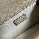 Side profile of polished statement women's handbag – women's luxury accessory