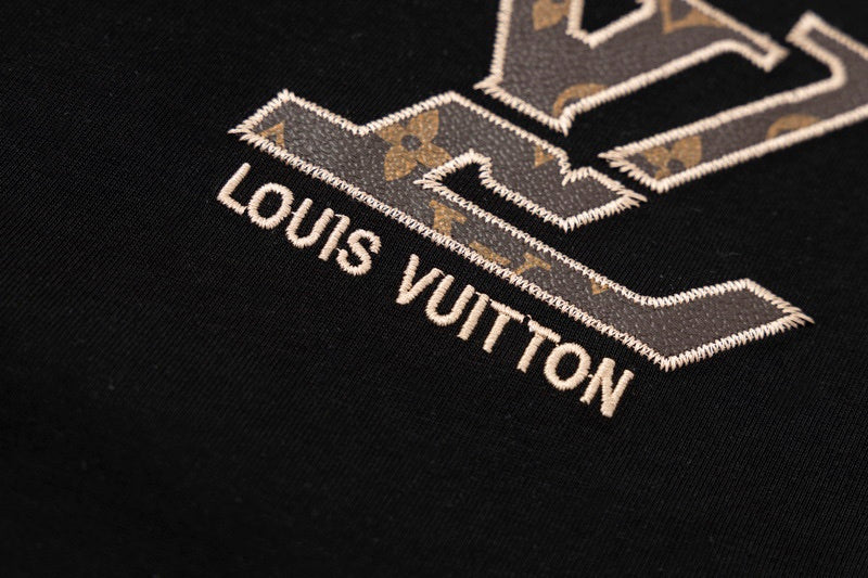 Flat lay presentation of Louis Vuitton cotton t-shirt with logo-detail design