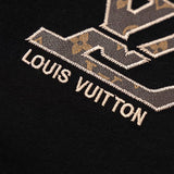 Flat lay presentation of Louis Vuitton cotton t-shirt with logo-detail design