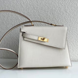 Side view of clean-lined structured handbag
