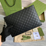 Front view of structured modern women's handbag – women's luxury accessory