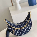 Handle and strap detail of structured everyday-luxe women's handbag – women's premium purse