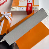 Handle and strap detail of polished refined women's handbag – women's designer-style accessory