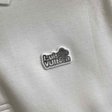 Back view of Louis Vuitton luxury clothing with label-forward styling